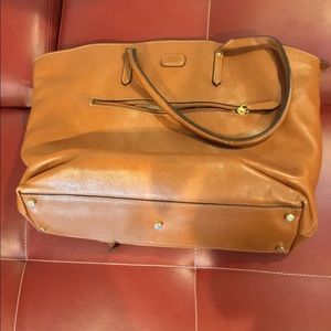 Brics carry-on luggage and leather handbag